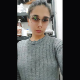 A beautiful brunette girl wearing glasses records herself pissing and shitting while sitting on a toilet. Action is seen from an under the ass perspective. Presented in 720P vertical HD format. Over 1.5 minutes.